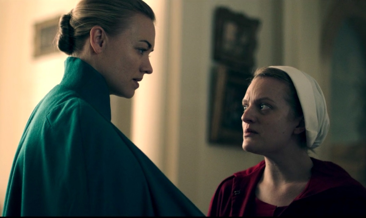 yvonne strahovski and elisabeth moss on the handmaid's tale