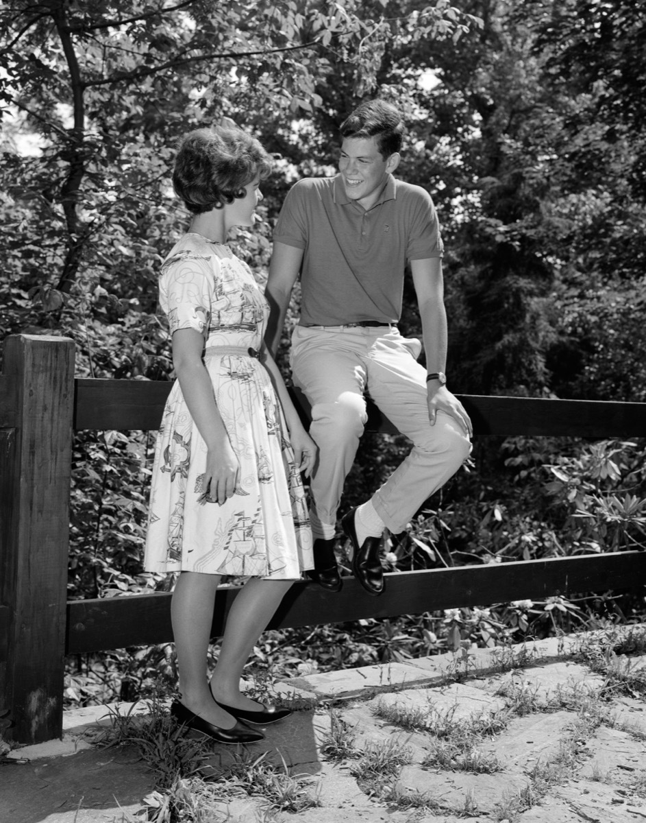 Two Teenagers Flirting in the 1960s