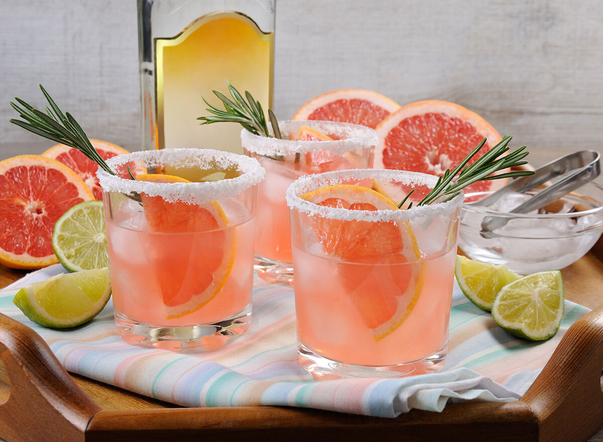 paloma cocktail grapefruit fruit garnish in glass on tray