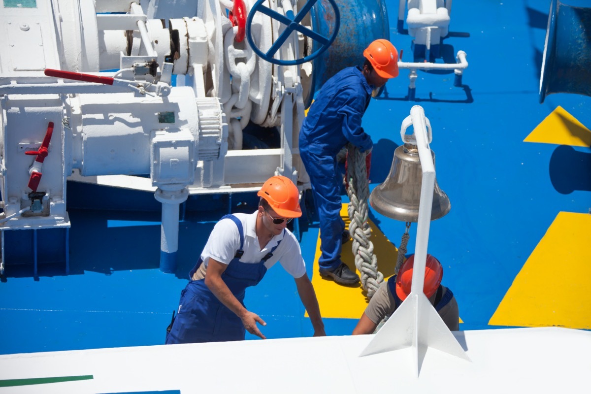 cruise ship crew working on the deck