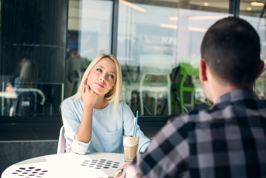 couples drinking coffee- signs hes not into you