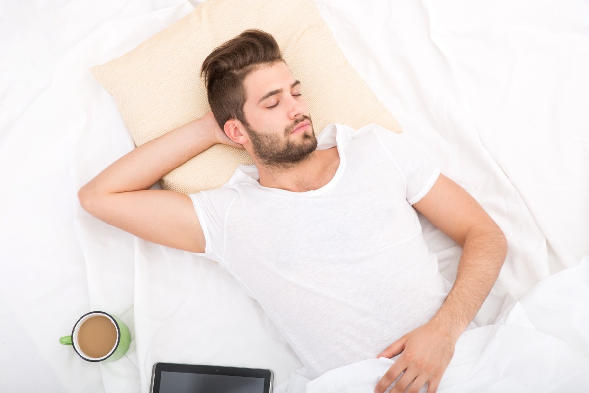 Man Taking Quick Coffee Nap