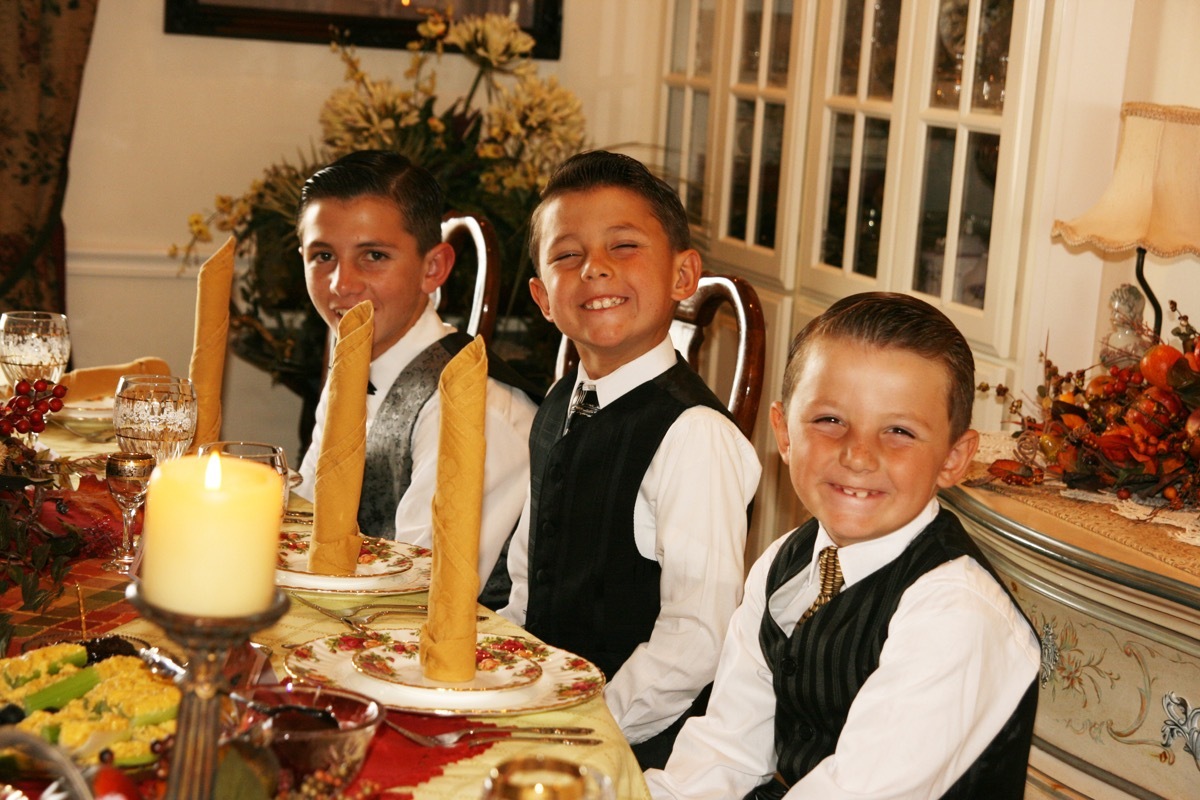 Young boys dressed up formally for a holiday dinner