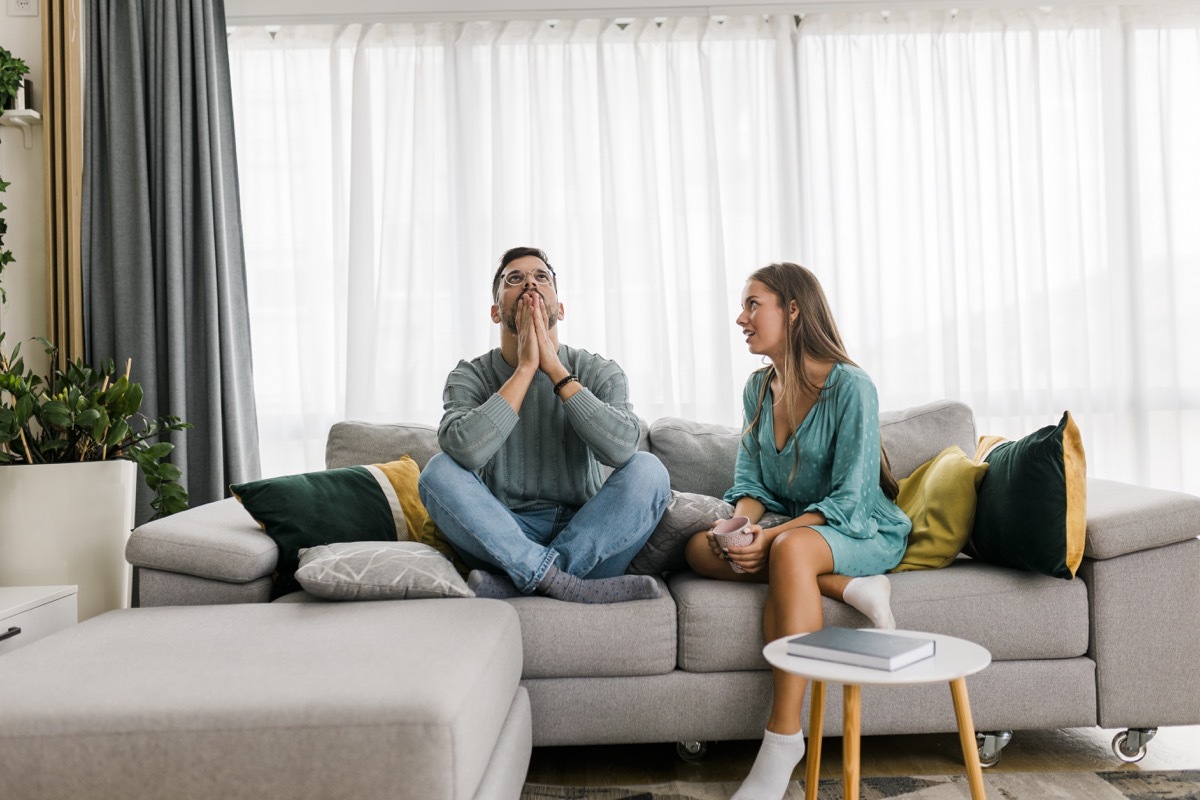 Shot of a young couple having an argument at home