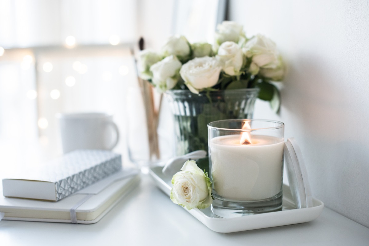 white candle on white decor background