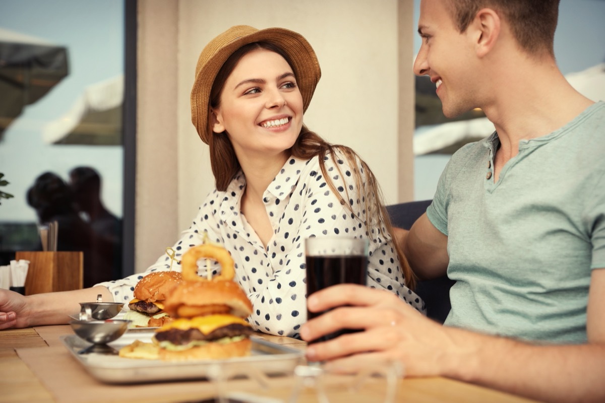 eating burgers on a date