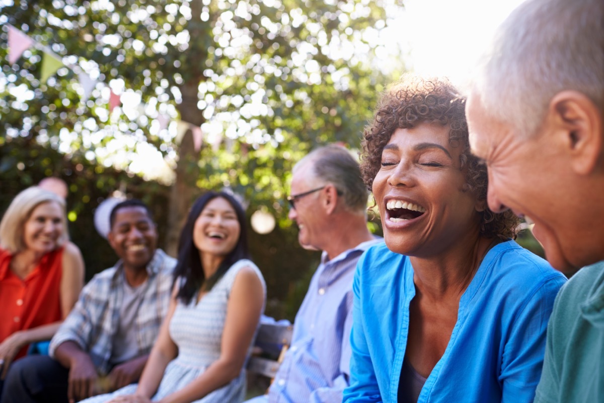 woman laughing social butterfly