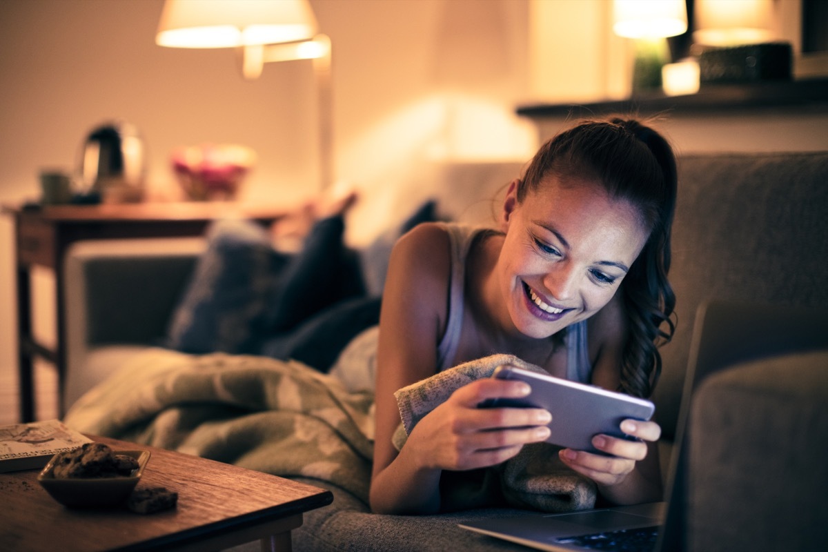 woman watching videos on her phone