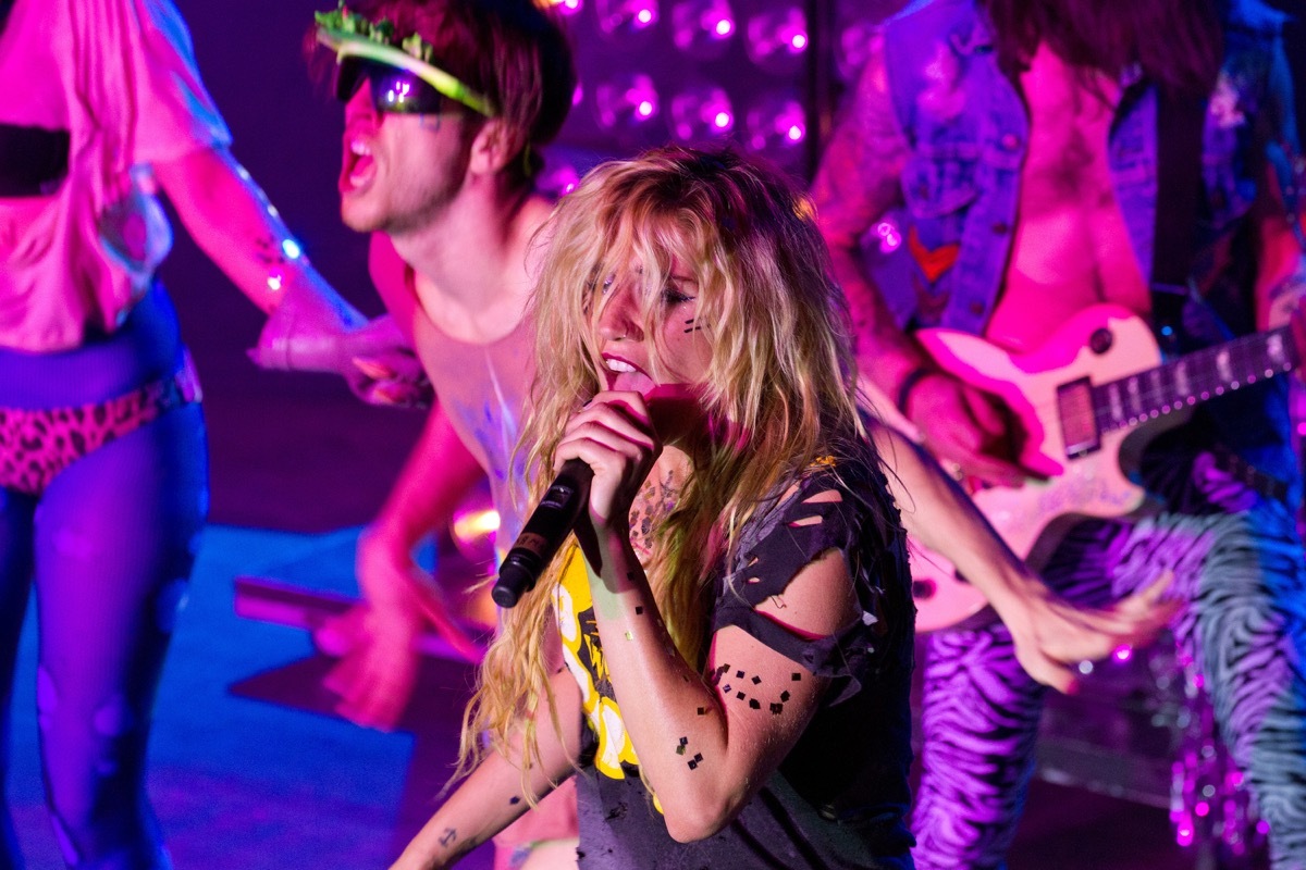 kesha performing on stage, best breakup songs