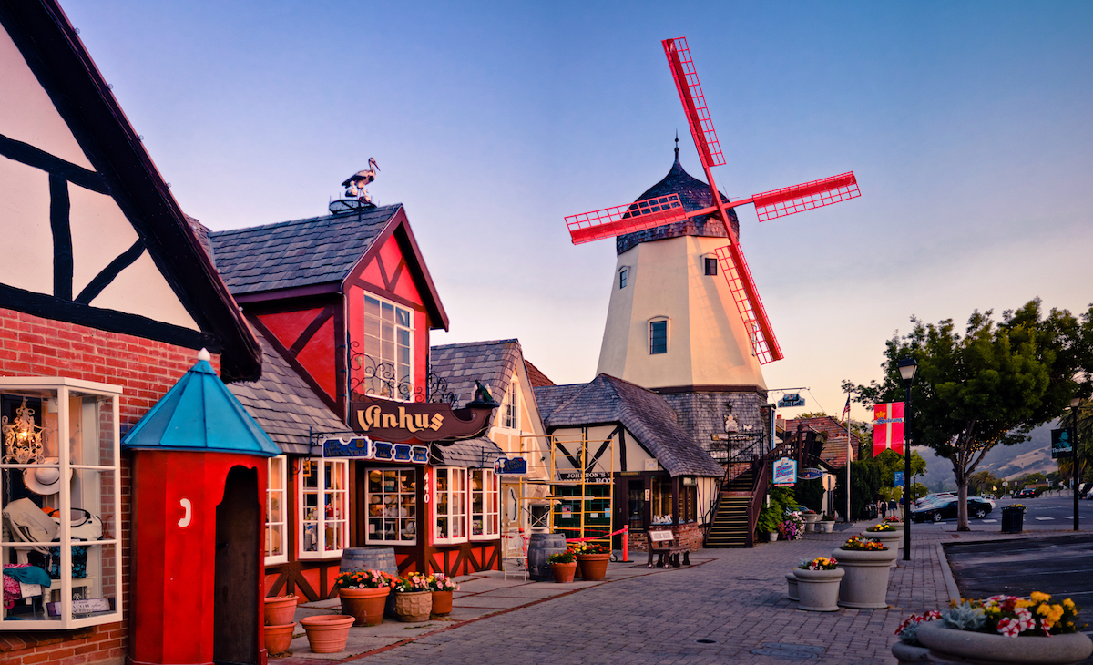 The Danish-style village of Solvang, California. Shot of the main street with windmill in background.