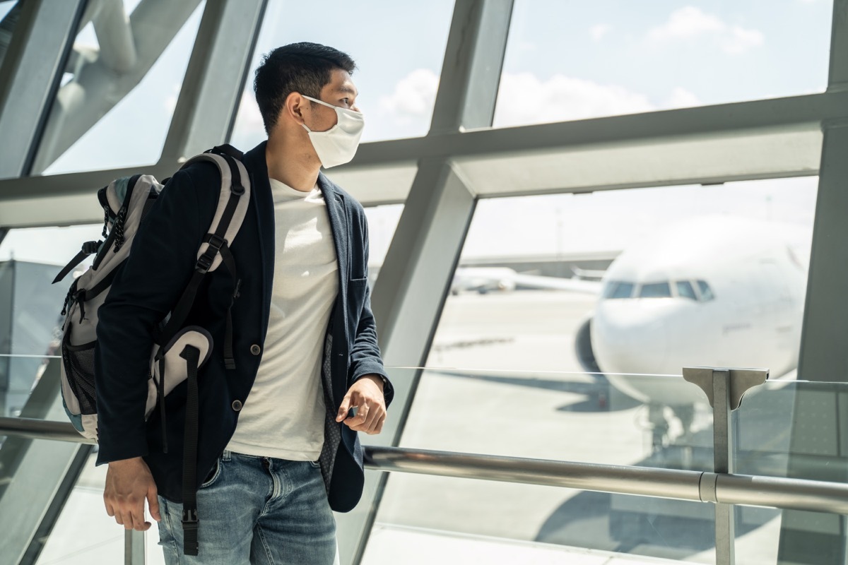 masked man at airport