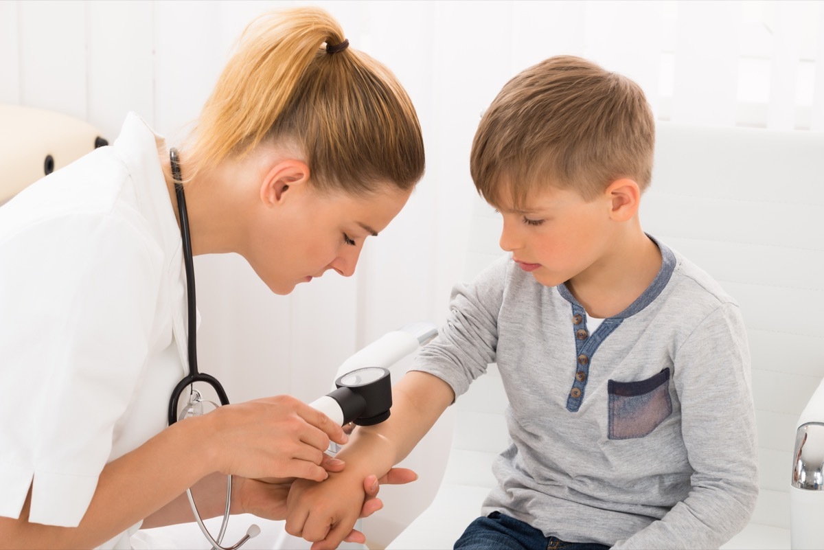 Little White Boy at the Nurse's Office Classroom Germs