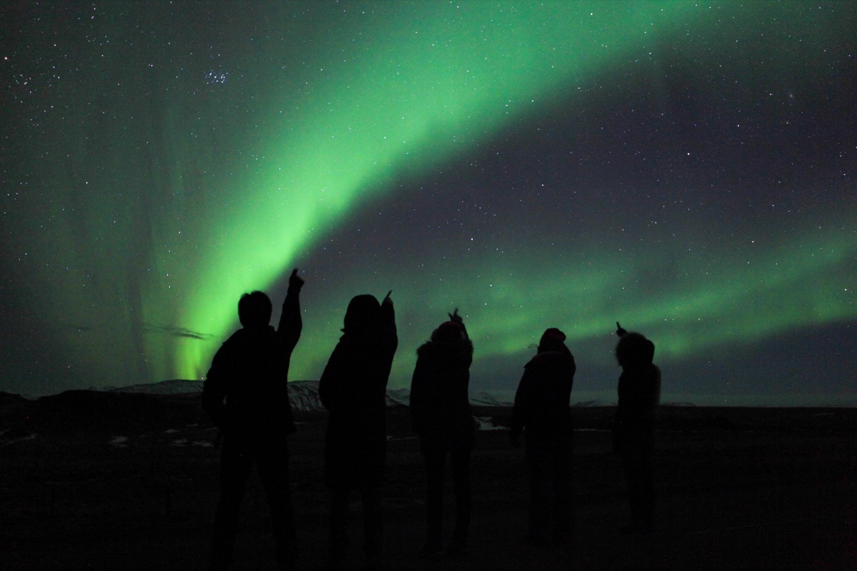 looking up at northern lights