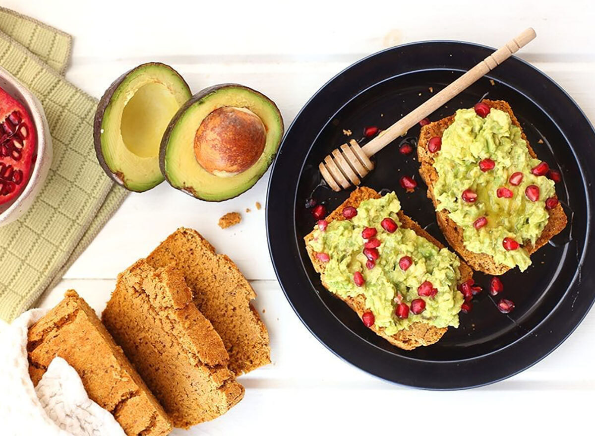 cornbread avocado toast with honey dipper