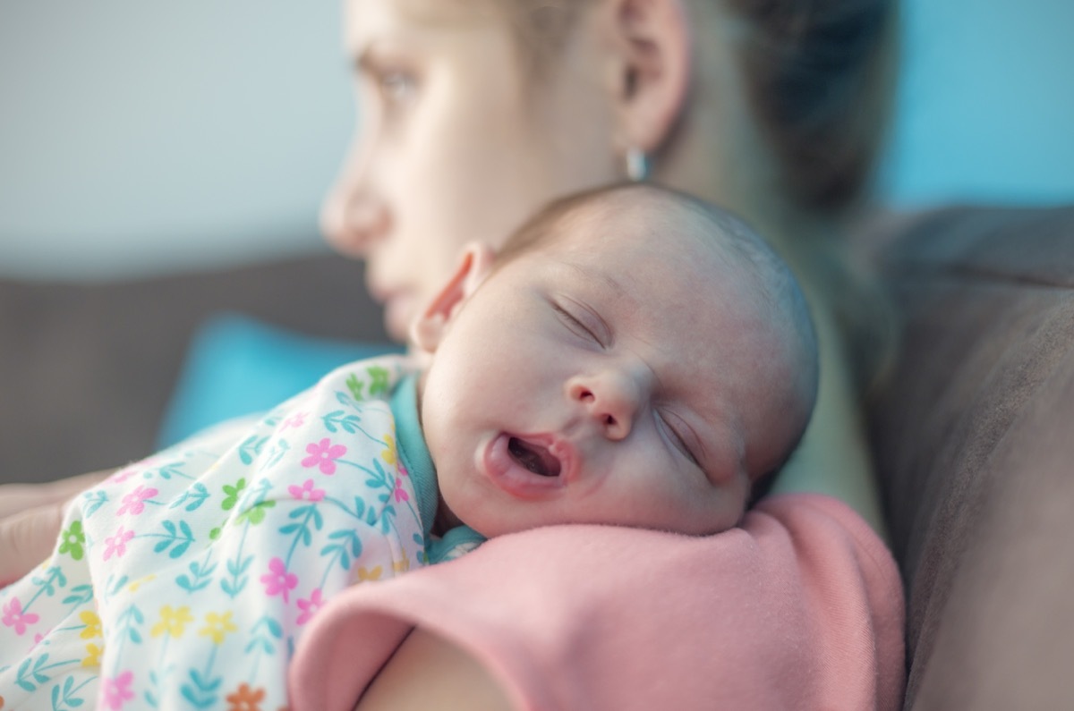 Tired Mother Suffering From Post Natal Depression