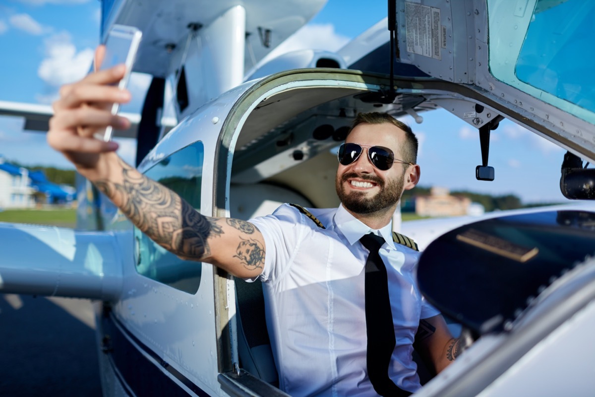 young pilot taking a selfie