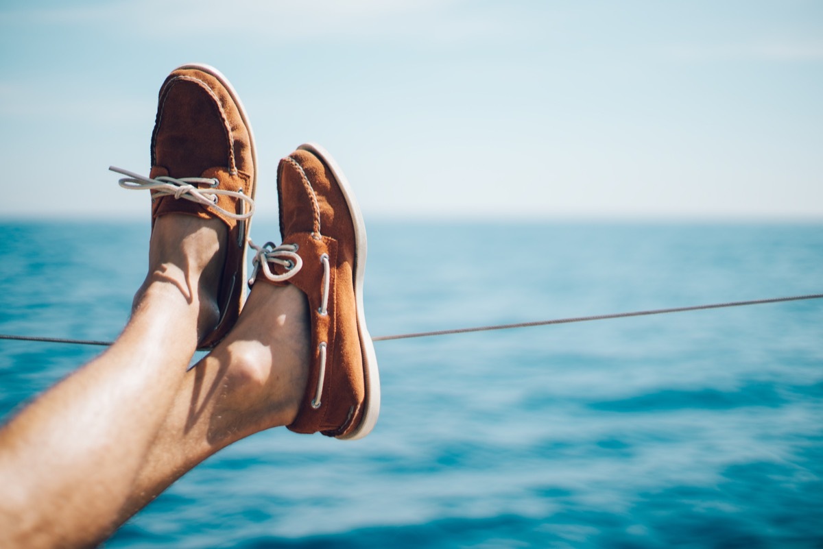 man wearing boat shoes