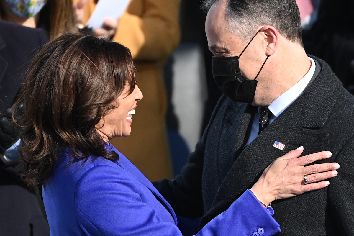 Kamala Harris is embraced by her husband Doug Emhoff after being sworn in as the 46th US Vice President by Supreme Court Justice Sonia Sotomayor on January 20, 2021, at the US Capitol in Washington, DC.