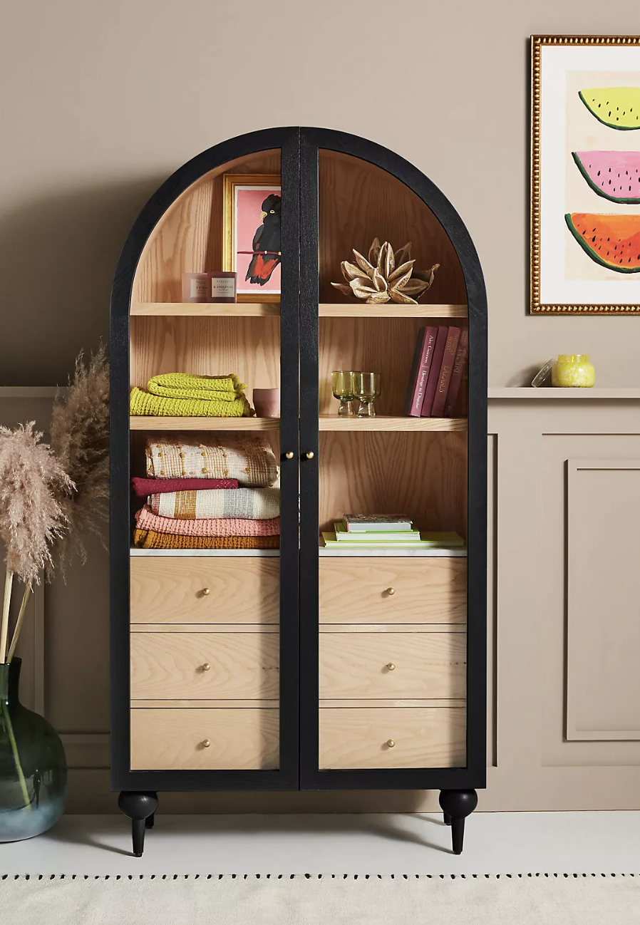 Styled product shot of Anthropologie's Fern Storage Cabinet