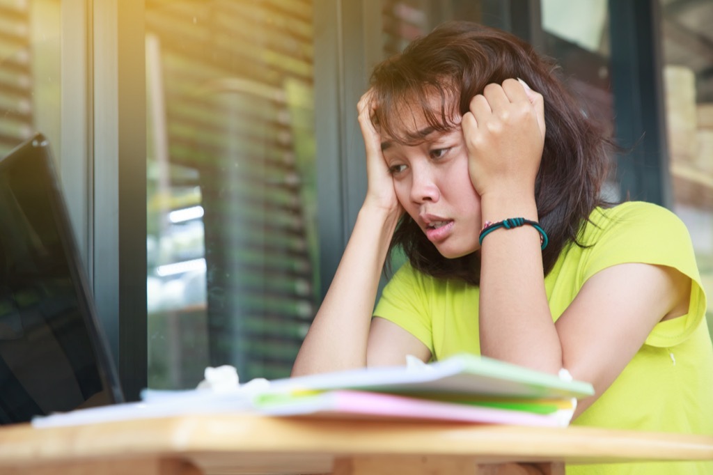 Girl is stressed because she didn't prepare for her exam