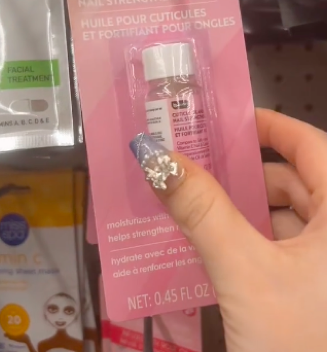 still from TikTok showing Dollar Tree cuticle oil