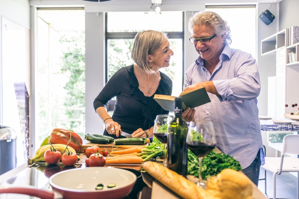 older couple cooking together