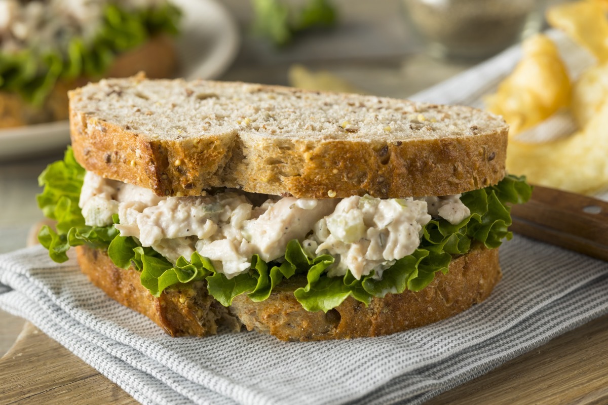 chicken salad sandwich on napkin