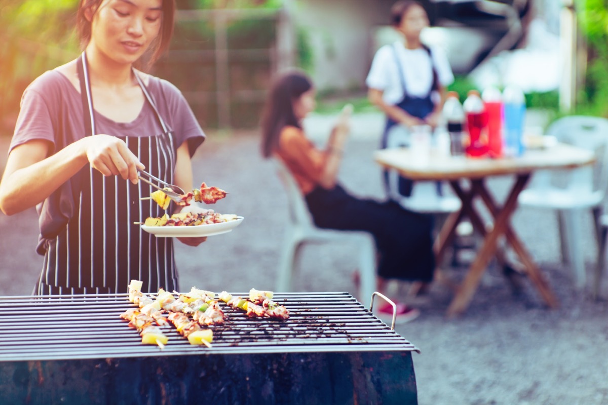 Woman grilling