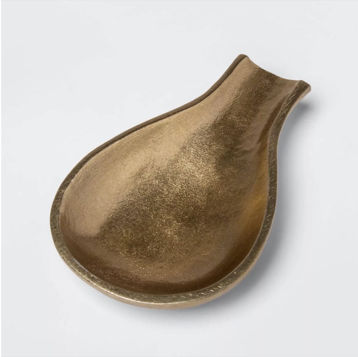 gold toned spoon rest