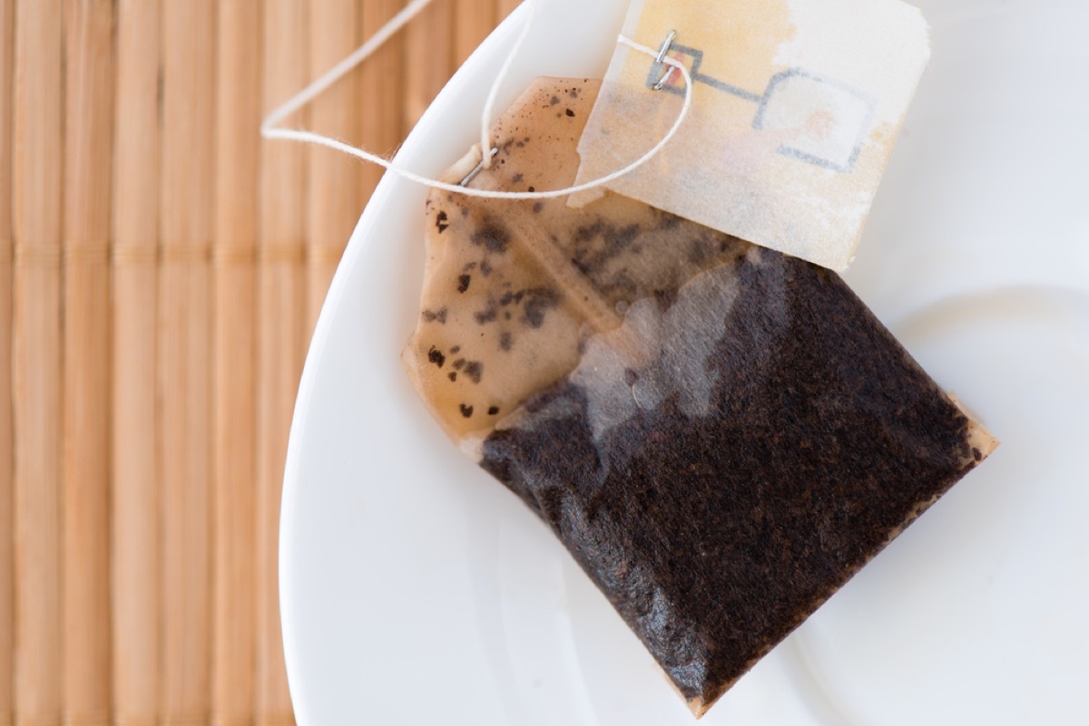 used tea bag on plate, old school cleaning tips