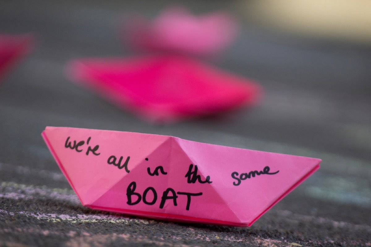 plastic ban protests in Oxford Circus in London show little pink boats that read 