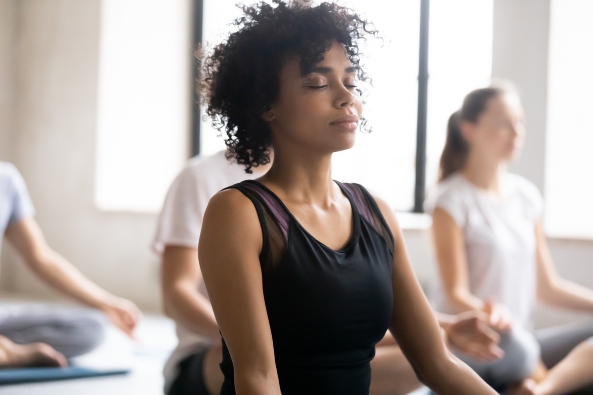 Woman Breathing Deep and Easing Stress