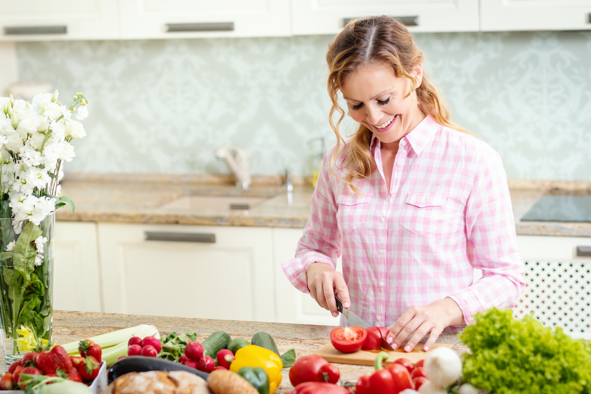 Woman chopping vegetables