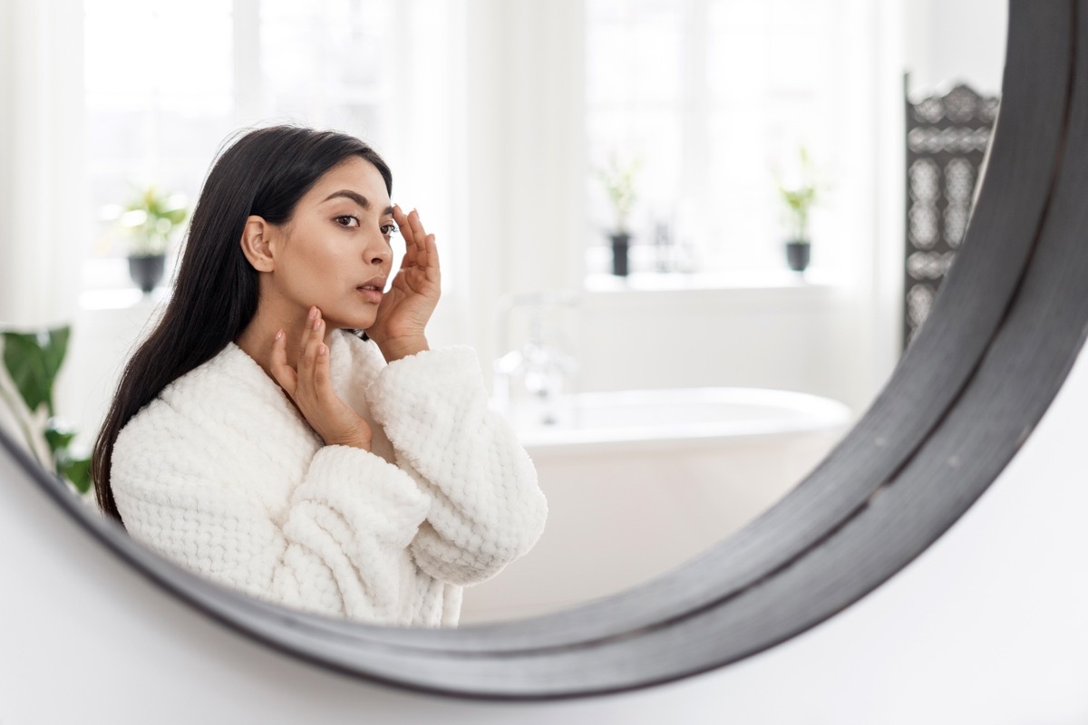 Skincare and beauty concept. Side portrait view of young woman