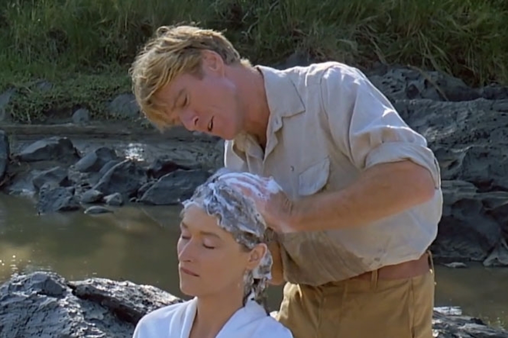 man washing woman's hair, romantic gestures