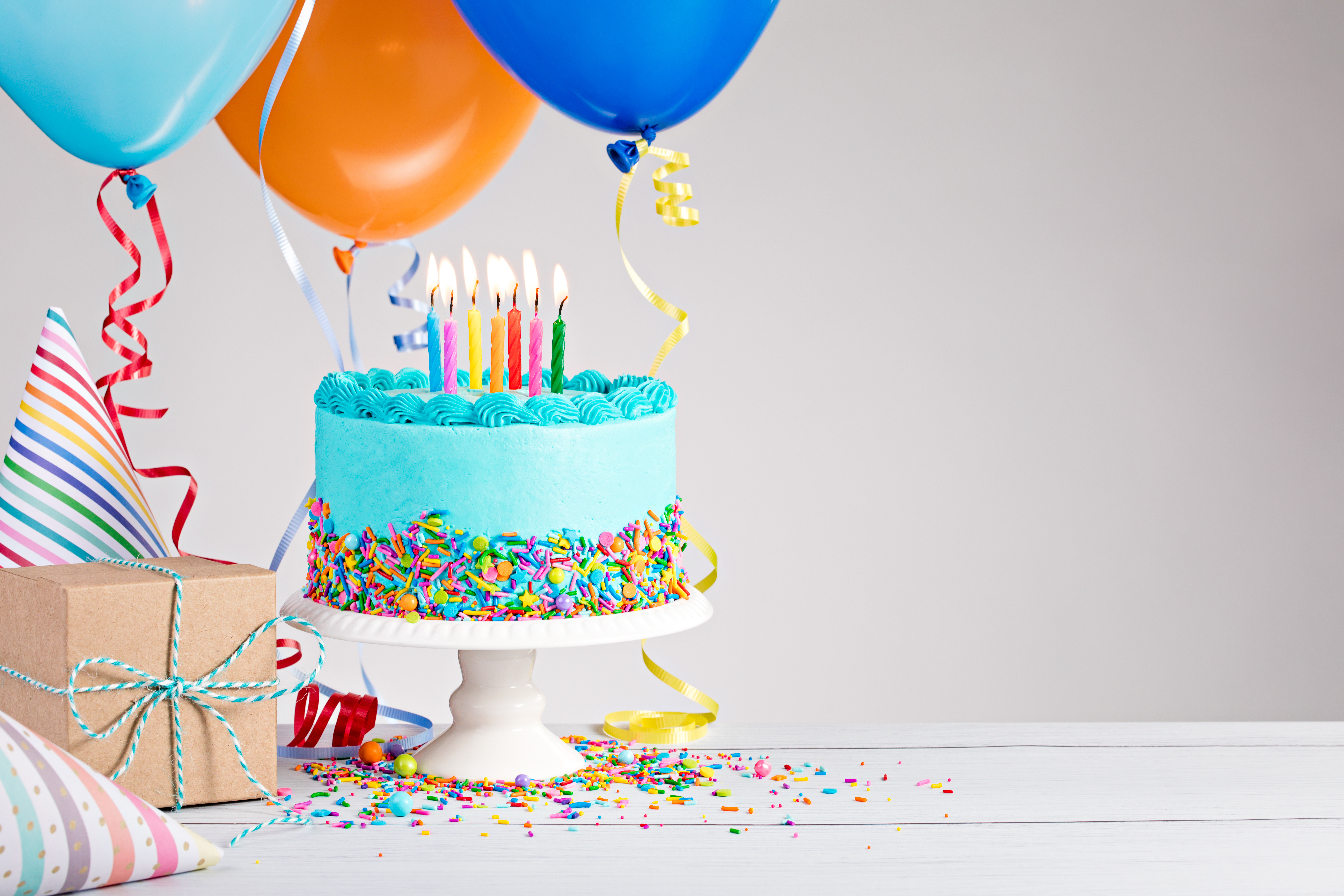 cake and balloons for a birthday celebration