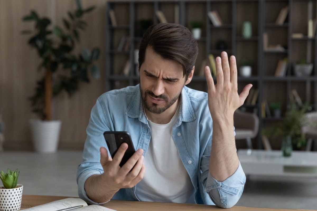 Man Upset By His Phone