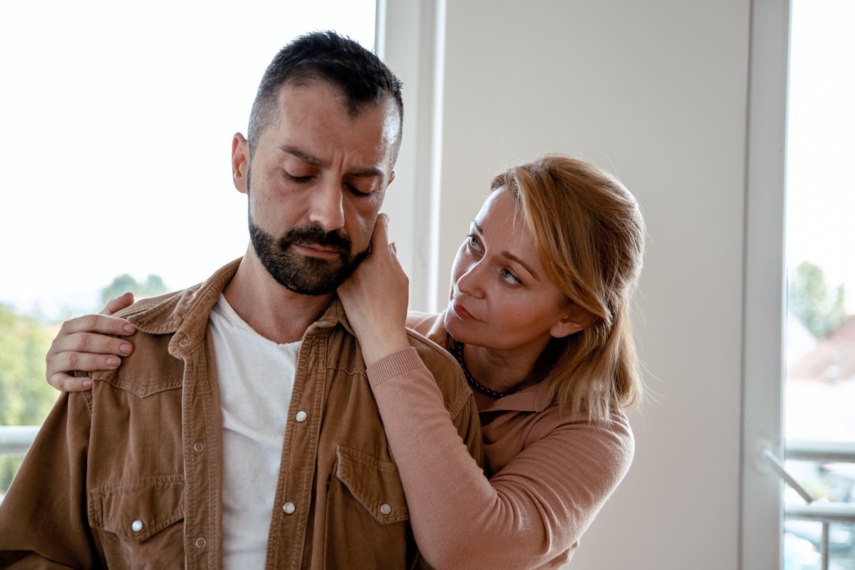 woman consoling man