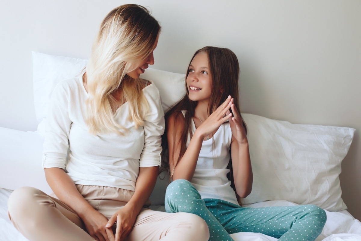 Mom and pre-teen daughter talking