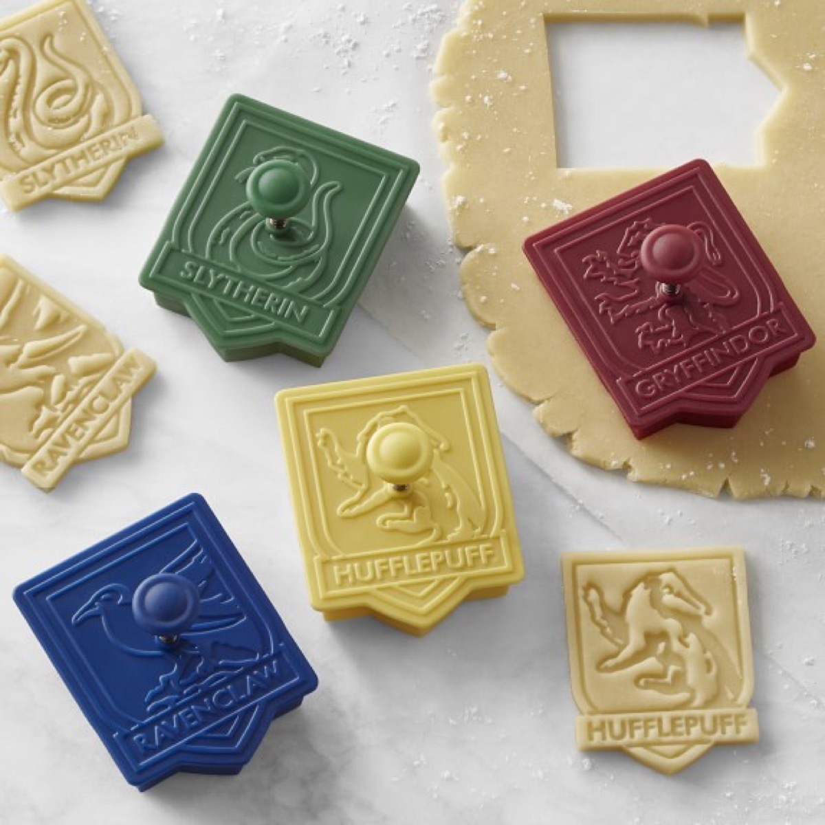 harry potter crest cookie cutters and raw cookie dough