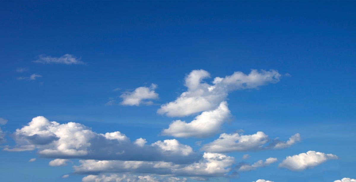 clear blue skies with clouds