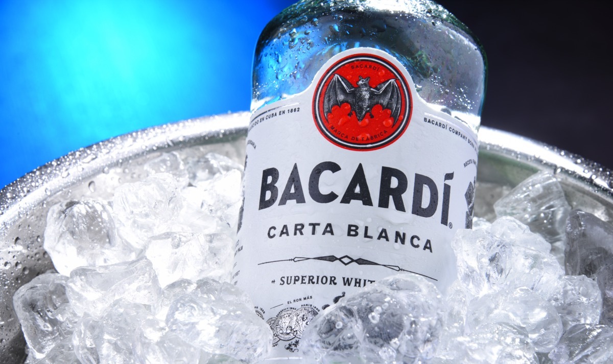 Bottle of bacardi in a bucket of ice