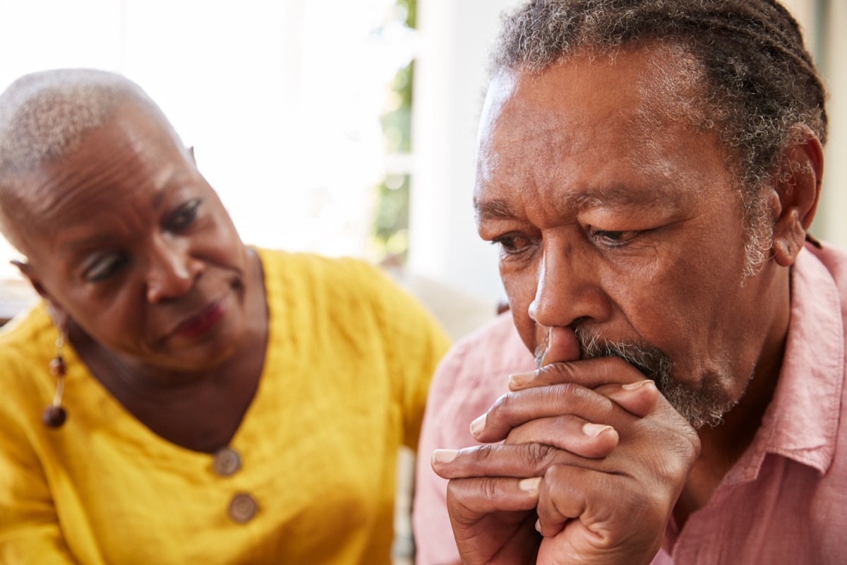 Man experiencing anxiety and depression wife helping him