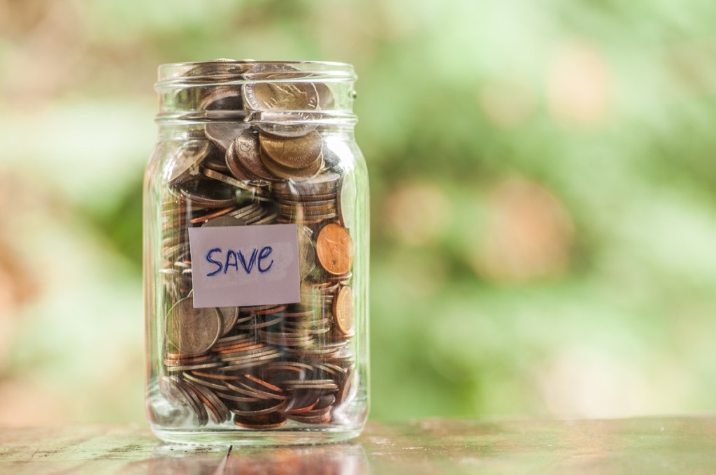 jar filled with change labeled 