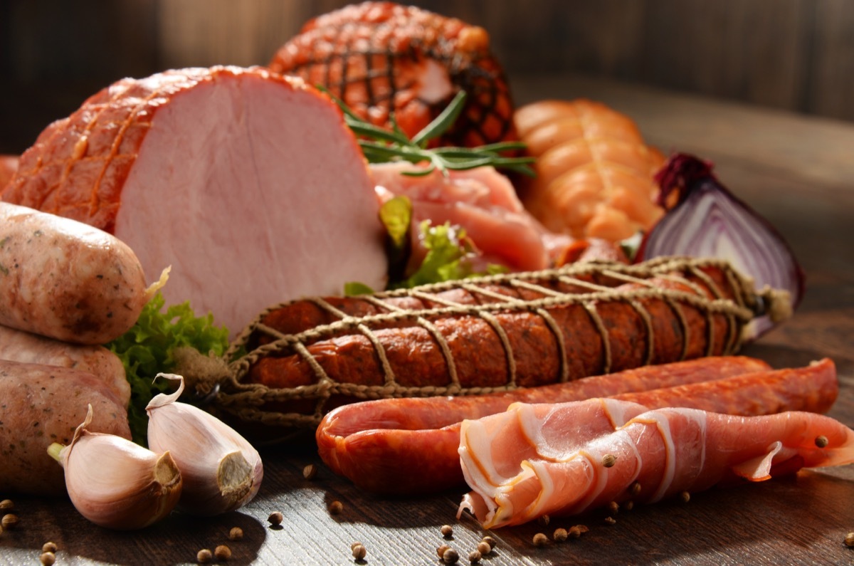 pork products like ham and sausage on counter