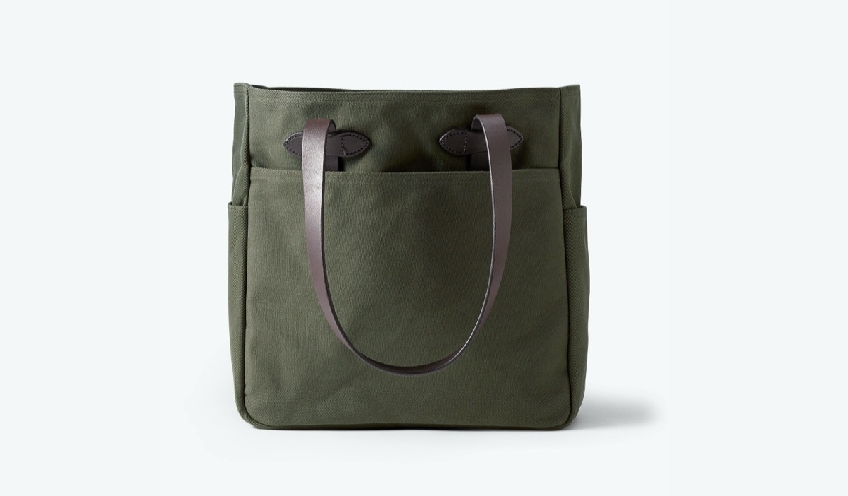 green canvas tote with leather straps