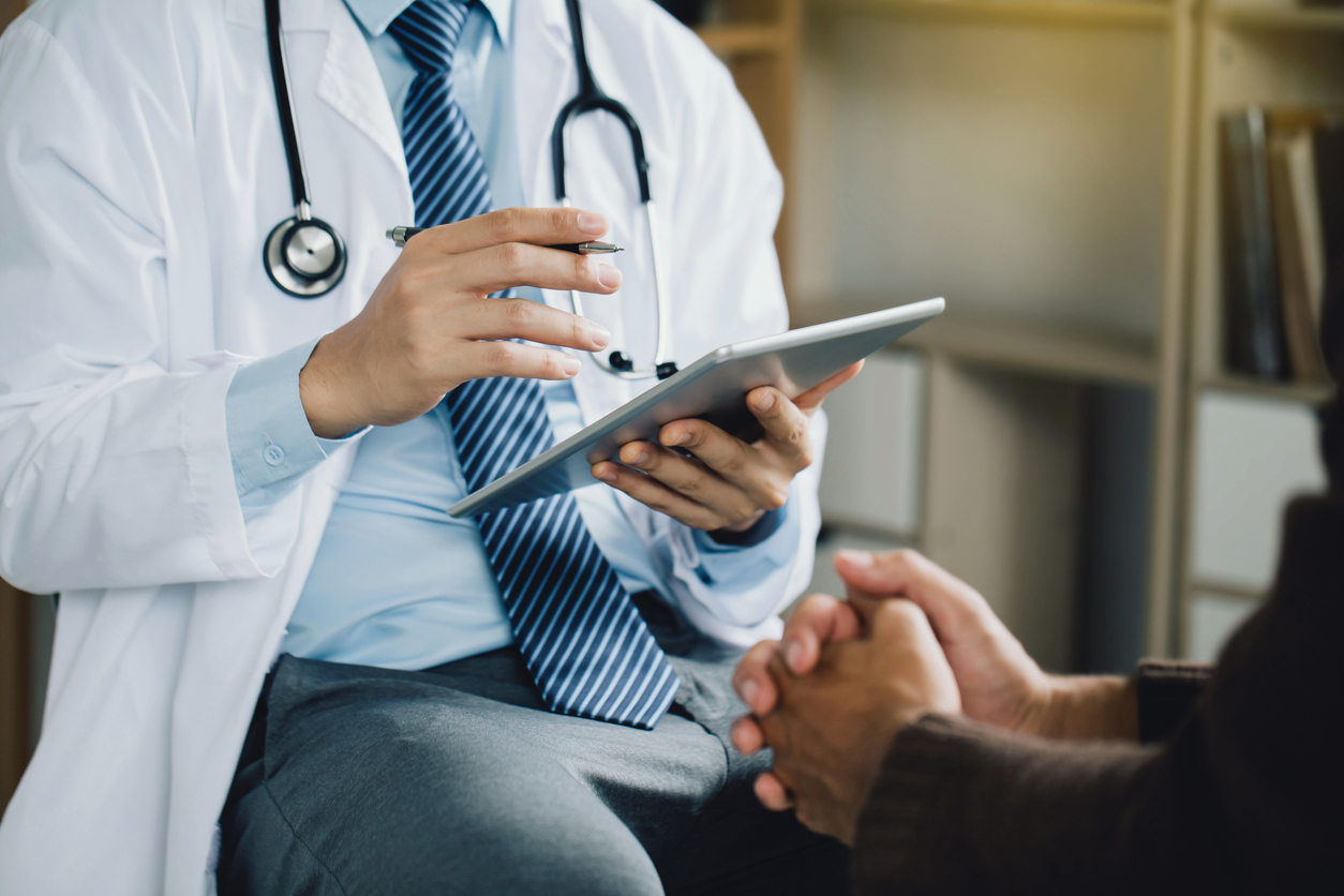 Doctor speaking with patient.